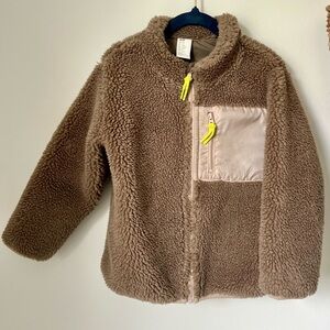 Toddler teddy zip up. Neon zip detail and side pocket